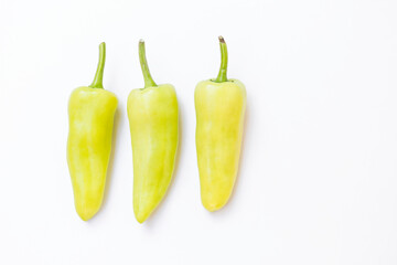 Fresh green chilli on white background, spicy vegetable, agriculture 