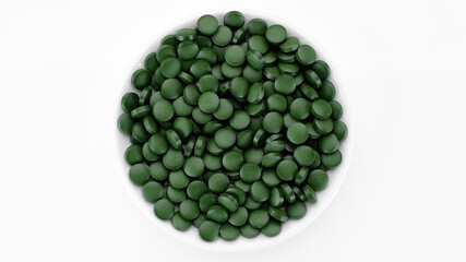 superfoods Spirulina, chlorella supplement green pills top view isolated on white background