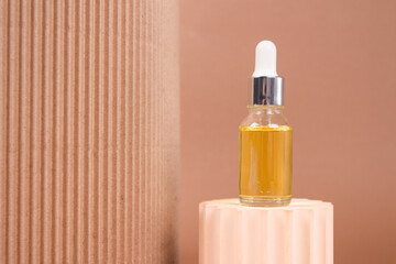 Mockup dropper bottle - natural organic cosmetics, hyaluronic acid, serum, moisturizer or facial anti-aging oil. Essential oil in trendy neutral still life composition. Modern apothecary