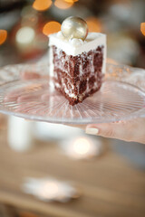 Plate with slice of tasty homemade chocolate cake. High quality photo.