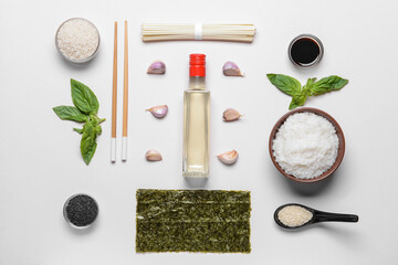 Composition with rice vinegar  on light background