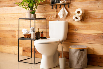 Modern toilet bowl in interior of bathroom