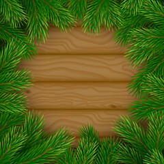 Wooden background with fir branches