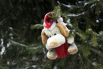 Toy dog on the Christmas tree