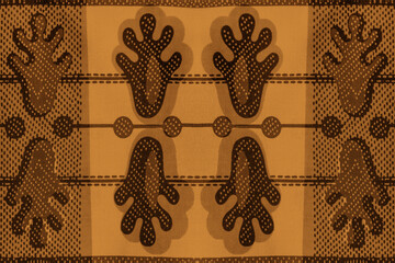 African fabric, cotton (textured, seamless) – Hands – Orange and brown colors, photo