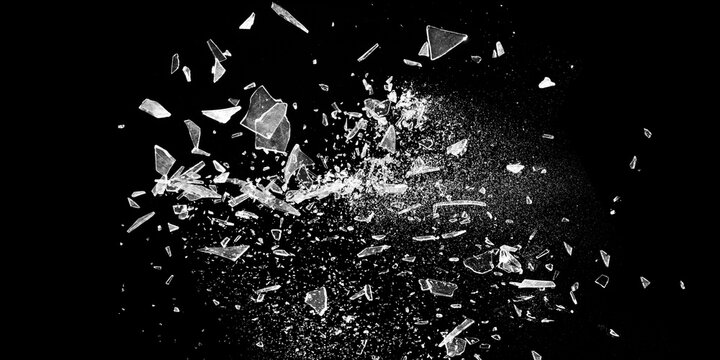 Small pieces of broken glass isolated on black background