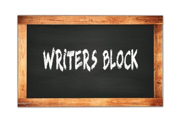 WRITERS  BLOCK text written on wooden frame school blackboard.