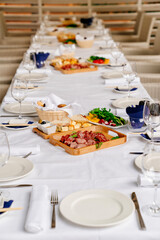table served with light meat and fish snacks.