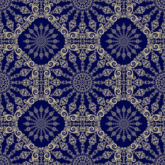 Seamless blue background with beige mandala ornament in the east style. Ideal for printing on fabric or paper for textile, wrapping. Vector illustration.
