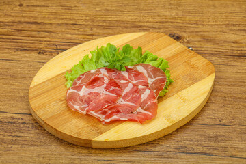Fototapeta premium Smoked pork neck slices snack