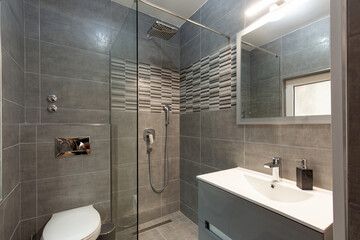 Interior of a hotel bathroom with shower cabin