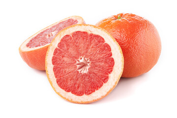 Citrus grapefruit whole and half slices on the white background, macro close-up