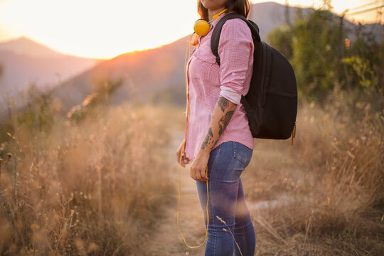 Girl going for a walk with music in her ears