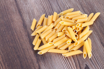 Looking down on a pile of macaroni on the table