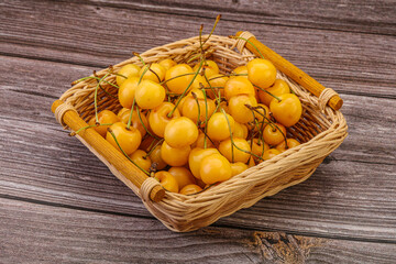 Sweet ripe yellow cherry heap