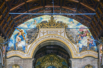 Fototapeta na wymiar wall covered with azulejos of religious inspiration inside the church of Valega district of Aveiro, Portugal