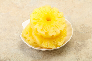 Sweet pineapple rings in the bowl