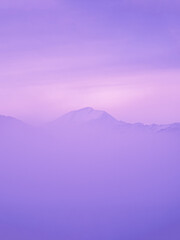 Fantastic mountain covered with purple mist, fabulous surreal  inspiration landscape