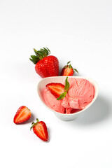 Strawberry ice-cream and strawberry in studio