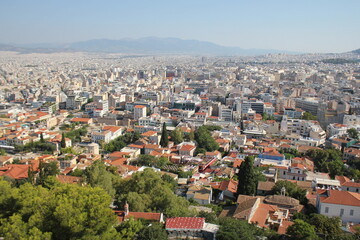 Fototapeta na wymiar View over the city from Acropolis hill in Athens, Greece. Panorama of Athens
