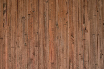 Background from narrow vertically arranged wooden planks with copy space. Wood texture.