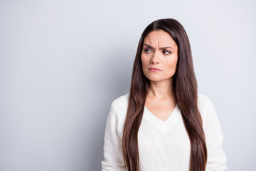Fototapeta premium Photo of mature serious unhappy upset negative stressed woman look copyspace isolated on grey color background