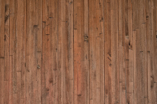 Background from narrow vertically arranged wooden planks with copy space. Wood texture. © Marina