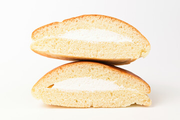Bread with cream on white background