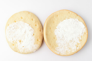 Bread with cream on white background