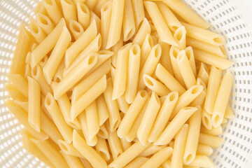 cooked pasta on white background
