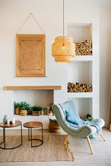 Scandinavian-style interior with a decorative fireplace and niches in the wall  © andrey