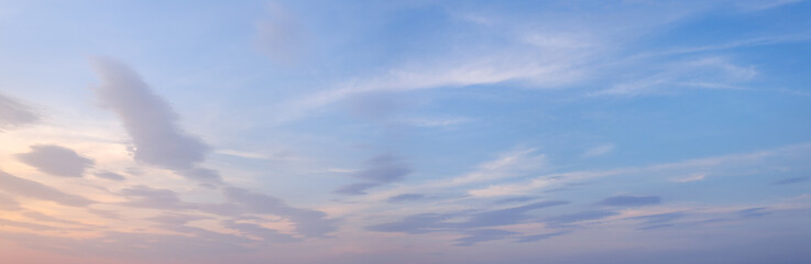 Panorama of colorful sky background with clouds at sunset