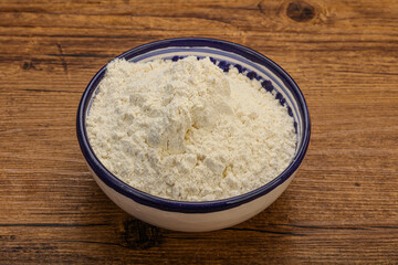 Wheat flour heap in the bowl