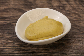 Dijon mustard sauce in the bowl
