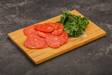 Italian spycy pepperoni sausage slices
