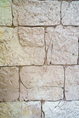 wall of rectangular stone bricks. background and texture of cobblestones. 