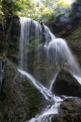 Fototapeta na wymiar waterfall in the forest,nature,trail,water