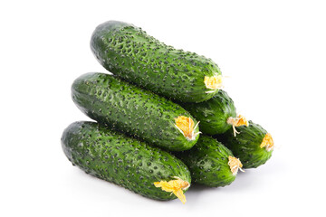 Fresh vegetables: green cucumbers isolated on white background macro close up. 
