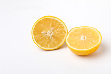 Fototapeta na wymiar Fresh Half cut sweet lemon or mosambi fruit on white background