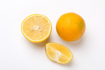 Fresh Half cut sweet lemon or mosambi fruit on white background