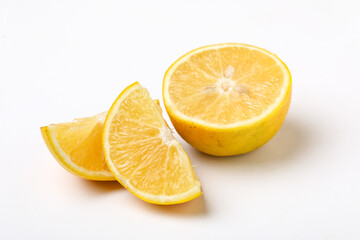 Fresh Half cut sweet lemon or mosambi fruit on white background