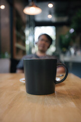 person with cup of coffee