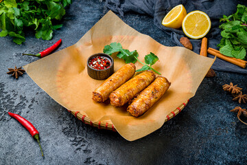 fried Spring Roll , Vietnamese Food on black stone table