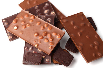 Chocolate bars with almonds and nuts close up on white isolated background with cut out flat lay