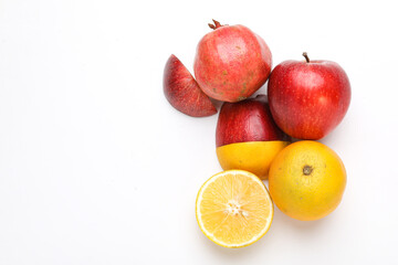 Apple,pomegranate and sweet lemon mosambi slice on white background
