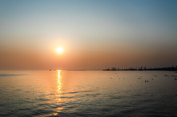 View from the yacht of a beautiful sunset over the sea.
