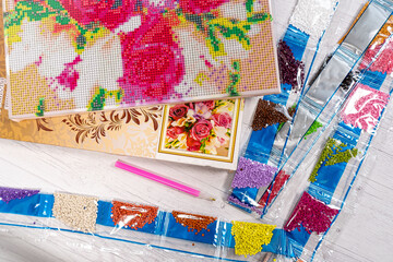 Set for beading. Beads in packages. Threads in the palette