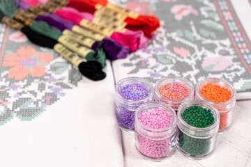 Set for beading. Beads in packages. Threads in the palette