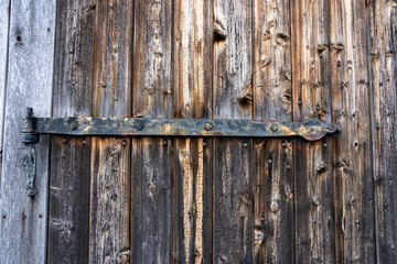 wooden door of a characteristic stable for German moorland sheep in the natural preserve Lueneburger Heide