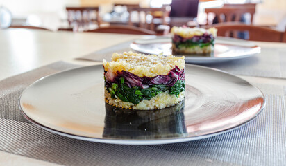 Potato cakes, spinach and radicchio. Vegan recipe